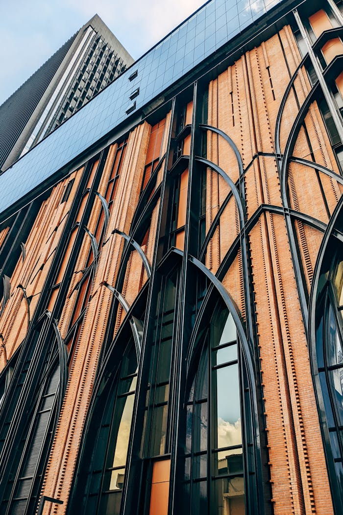 digital A striking modern building with gothic-inspired architecture, featuring steel and glass elements.